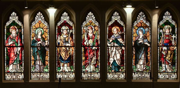 Panel of saints in Gallery Window. Inscription reads: "In memory of James White of Clonakilty who died in California in 1867 by his loving sister Ane"