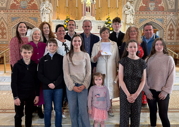 Maura Whelton pictured with her extended family in the Church of Our Lady, Star of the Sea, Barryroe Photo: Paul Finn.