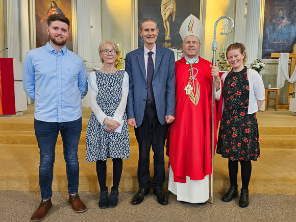 At Kinsale Parish Church In 2024 when Paul was admitted to Candidacy for Ordination, Paul is seen with Bishop Fintan Gavin, along with Paul's wife Bríd, their daughter Anne and son Tomás. (Photo: Mariana Wirsam).